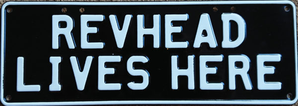 Novelty Number Plate - Revhead Lives Here - White On Black